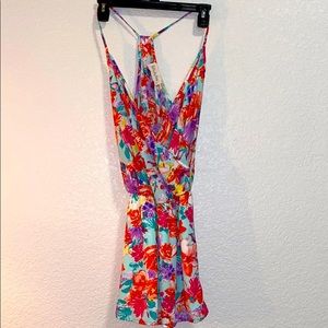 Floral romper. Never worn.
